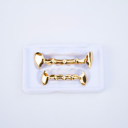 Gold Open Face Fang Grillz - The Gifted Few